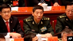 资料照 - 2017年10月18日，时任中央军委装备发展部部长的李尚福出席中共19大开幕式。