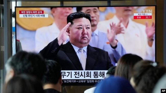 A news program shows North Korean leader Kim Jong Un at a parade to mark the 70th anniversary of the Korean War armistice, in Seoul, South Korea, July 28, 2023. Kim shared center stage with delegates from Russia and China at the event.