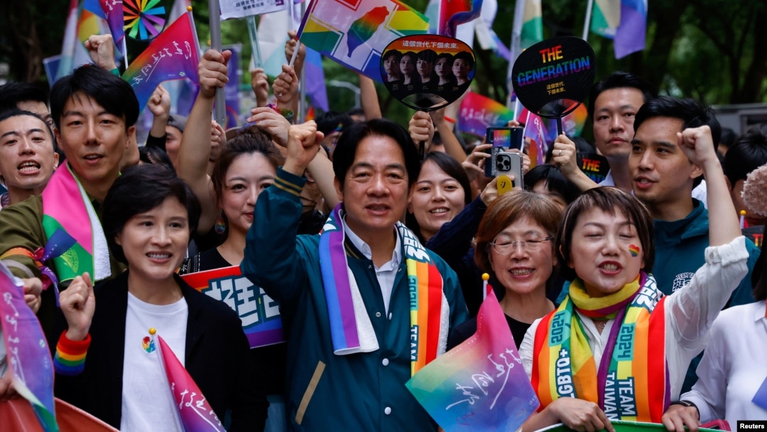 Taiwan's Vice President Lai Ching-te marches during the annual Taiwan's Pride parade in Taipei, Taiwan, Oct. 28, 2023.