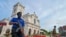 A navy sailor and police officers stand guard outside St. Anthony's church on the fifth anniversary of the Easter Sunday suicide attacks, in Colombo on April 21, 2024. 