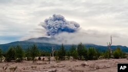 In this photo taken from AP video, provided by by the Institute of Volcanology and Seismology of the Far Eastern Branch of the Russian Academy of Sciences Aug. 18, 2024, the eruption of the Shiveluch volcano is seen on Russia's Kamchatka Peninsula.