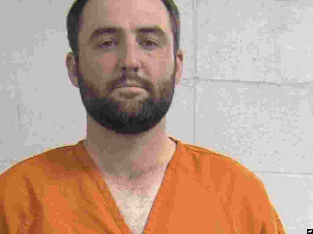 Masters champion Scottie Scheffler is seen in a mug shot provided by the Louisville Metropolitan Department of Corrections. The golfer was detained by police Friday morning on his way to the PGA Championship in Louisville, Kentucky.
