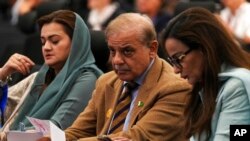 FILE - Muhammad Shehbaz Sharif, prime minister of Pakistan, listens to speeches at the COP27 U.N. Climate Summit, Nov. 8, 2022, in Sharm el-Sheikh, Egypt. 