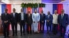Haiti's transitional council members pose for a group photo after a ceremony to name its president and a prime minister, in Port-au-Prince, Haiti, April 30, 2024.