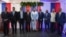 FILE - Haiti's transitional presidential council members pose for a group photo in Port-au-Prince, Haiti, April 30, 2024. Louis Gerald Gilles is pictured on the right. Smith Augustin is third from right and Emmanuel Vertilaire is fourth from right. 