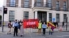 FILE - Demonstrators protest human rights violations of various groups by China at the Chinese Embassy in London, Oct. 1, 2024. Groups gathered Dec. 10, 2024, to demand that the British government confront China's ongoing abuses. (Kris Cheng/VOA Cantonese Service)