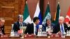 U.S. President Joe Biden (R) speaks with British Prime Minister Rishi Sunak (C) as U.S. Secretary of State Antony Blinken (2-L) and Turkish President Recep Tayyip Erdogan watch, during a session of the G20 summit in New Delhi, India, Sept. 9, 2023.