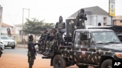 FILE - Military forces secure an area in Anambra, Nigeria, Feb. 24, 2023. The military said gunmen killed six civilians and five soldiers in an attack in the country's southeastern Abia state on May 30, 2024.