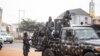 FILE - Military forces secure an area in Anambra, Nigeria, Feb. 24, 2023. On May 16, 2023, armed men attacked a U.S. embassy convoy in southeast Anambra state.