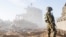 FILE - An Israeli soldier is seen during a mission in the Gaza Strip amid the ongoing conflict between Israel and the Palestinian Islamist group Hamas, in this handout photo released Dec. 30, 2023. (Israel Defense Forces/Handout via Reuters)