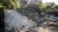 A general view of a damaged bridge after a small creek bursts its bank causing houses to flood in Havelock North, New Zealand, Feb. 18, 2023. 