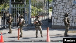 Canadian soldiers stand guard by the Canadian embassy as violence spreads and armed gangs expand their control over Port-au-Prince, Haiti, March 29, 2024.
