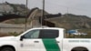 A Border Patrol vehicle sits near border walls separating Tijuana, Mexico, from the United States, June 4, 2024, in San Diego. 