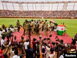 Supporters of Niger's coup leaders take part in a rally at a stadium in Niamey, Niger, August 6, 2023. (REUTERS/Mahamadou Hamidou)