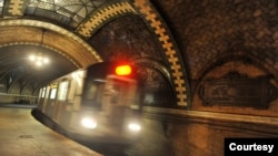 FILE -- A train comes around the curve at the Old City Hall Station in New York City. (Photo by Marc Hermann, MTA New York City Transit.)