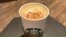 A Pumpkin Spice Latte drink rests on a table at a Starbucks in New York, Aug. 24, 2023. 