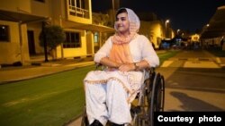 Breshna Musazai, who was injured in an attack at her university in Afghanistan in 2016, fled her country two days after the Taliban took control in 2021. Here she in Qatar in 2022, awaiting her U.S. resettlement case. (Photo courtesy of Breshna Musazai)
