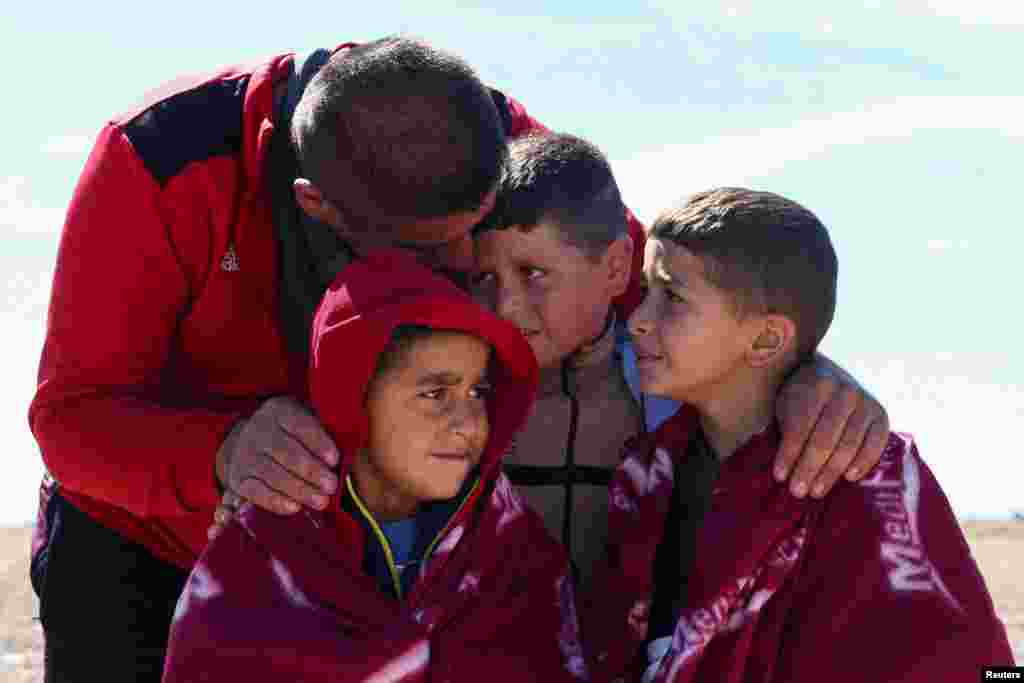 Migrants arrive in Dungeness, Britain.&nbsp;Dozens of men, women and children were brought ashore on the southern coast of England, tired but relieved to be on land after making the risky sea crossing from France in rubber dinghies.