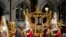 The Gold State Coach is led in a procession as it leaves Westminster Abbey in central London, May 3, 2023 during a rehearsal for the Coronation of King Charles III.