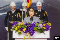 Taiwan's President Tsai Ing-wen speaks during the inauguration ceremony of home-made corvette warships in Yilan on March 26, 2024.