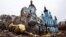 The Orthodox church of the Holy Mother of God-Joy of All Who Grieve lies in ruins in the village of Bohorodychne as a result of shelling amid Russia's attacks on Ukraine, March 18, 2023.