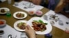 Hidangan yang terbuat dari daging anjing di Pyongyang House of Sweet Meat, restoran khusus daging anjing di Pyongyang, Korea Utara, Rabu, 25 Juli 2018. (AP/Dita Alangkara)