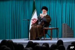Supreme Leader Ayatollah Ali Khamenei speaks in a meeting with a group of people in Tehran, Iran, Feb. 28, 2024. (Office of the Iranian Supreme Leader via AP)
