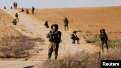Izraelski vojnici patroliraju područjem u blizini izraelske granice sa pojasom Gaze, na jugu Izraela, 19. oktobar 2023