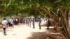FILE — In this AFP screengrab, Togolese security forces block the area where the opposition and civil society groups were holding a press conference on March 27 in Lome, Togo, to address constitutional reforms adopted by Parliament.