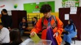 A person votes during the second round of the presidential election in Istanbul, Turkey, May 28, 2023.