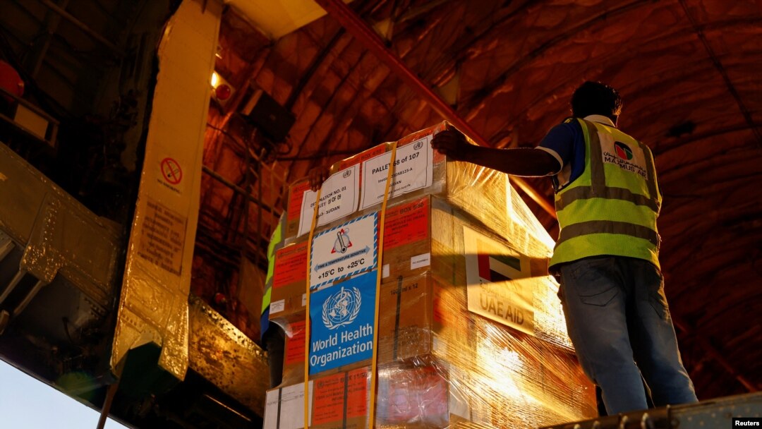 Aid supplies from World Health Organization (WHO) and UAE-AID are loaded into a plane for Port Sudan, at the Abu Dhabi International Airport, Abu Dhabi, United Arab Emirates, May 5, 2023. 