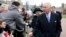 Britain's King Charles III and Queen Camilla greet people after attending the Easter Matins Service at St. George's Chapel, Windsor Castle, England, March 31, 2024. 