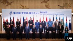 Leaders of Pacific island nations and territories pose for a group photo during the 10th Pacific Islands Leaders Meeting in Tokyo on July 18, 2024.