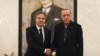 U.S. Secretary of State Antony Blinken, left, shakes hands with Turkish President Recep Tayyip Erdogan during their meeting at Esenboga airport in Ankara, Turkey, Feb. 20, 2023. 