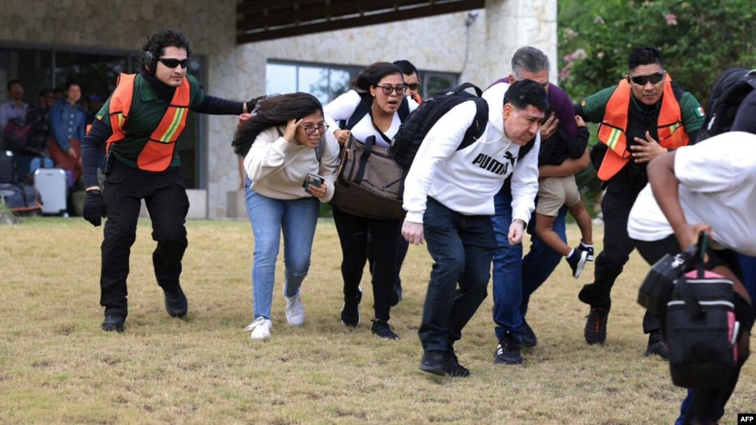 A Mexican Foreign Ministry photo released April 1, 2024, shows Mexican citizens being evacuated from an undetermined location in Haiti. Mexico evacuated its nationals because of the worsening security situation in the Caribbean country.