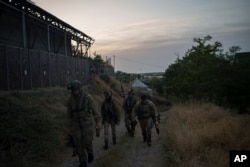 Ukraine Special Operations Forces return from a night mission in Kherson region, Ukraine, on June 10, 2023.