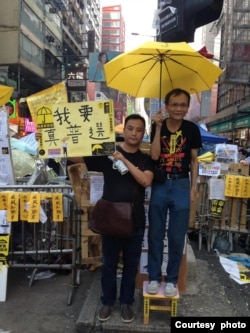 李小三(左)2014年在香港参加雨伞革命