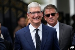 FILE - Apple CEO Tim Cook walks after a meeting with Indonesian President Joko Widodo in Jakarta, Indonesia, April 17, 2024. Cook was among the highest paid CEO's in 2023 according to the Associated Press survey of CEO pay.