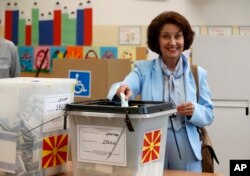 Gordana Siljanovska Davkova, presidential candidate backed by the opposition center-right VMRO-DPMNE party, casts her ballot at a polling station in Skopje, North Macedonia, May 8, 2024.