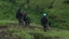 Des habitants et humanitaires pris au piège des combats dans l'est de la RDC