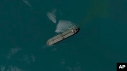 This satellite image from Planet Labs PBC shows the seized oil tanker Niovi off the coast of Bandar Abbas, Iran, May 6, 2023. (Planet Labs PBC via AP)