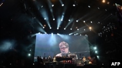 Elton John closes out Britain's legendary Glastonbury Festival on Sunday in what has been billed as his final UK performance. The 76-year-old pop superstar is winding down a glittering live career with a global farewell tour.