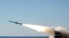 Photo shows missile launched during training exercise from an unknown location. Iran has equipped its Revolutionary Guards' navy with drones and 1,000-km (600-mile) range missiles.