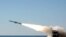 Photo shows missile launched during training exercise from an unknown location. Iran has equipped its Revolutionary Guards' navy with drones and 1,000-km (600-mile) range missiles.