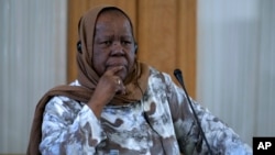 FILE - South Africa's Foreign Minister Naledi Pandor listens to translation during a joint press briefing with her Iranian counterpart Hossein Amirabdollahian in Tehran, Iran on Sunday, October 22, 2023.