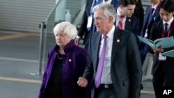U.S. Treasury Secretary Janet Yellen and Federal Reserve Chairman Jerome Powell walk to a photo session of Group of Seven finance ministers and central bank governors with invited non-G7 countries' counterparts, in Niigata, Japan, May 12, 2023.