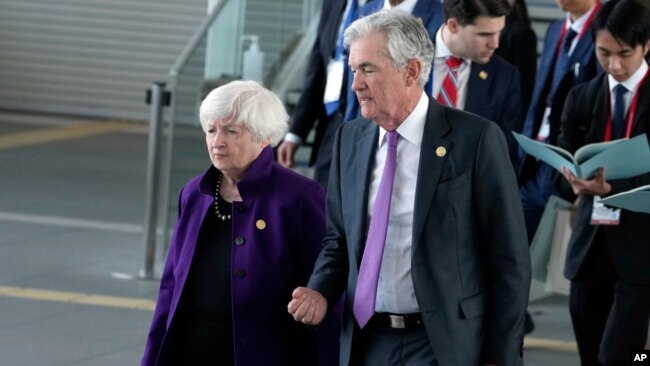 U.S. Treasury Secretary Janet Yellen and Federal Reserve Chairman Jerome Powell walk to a photo session of Group of Seven finance ministers and central bank governors with invited non-G7 countries' counterparts, in Niigata, Japan, May 12, 2023.