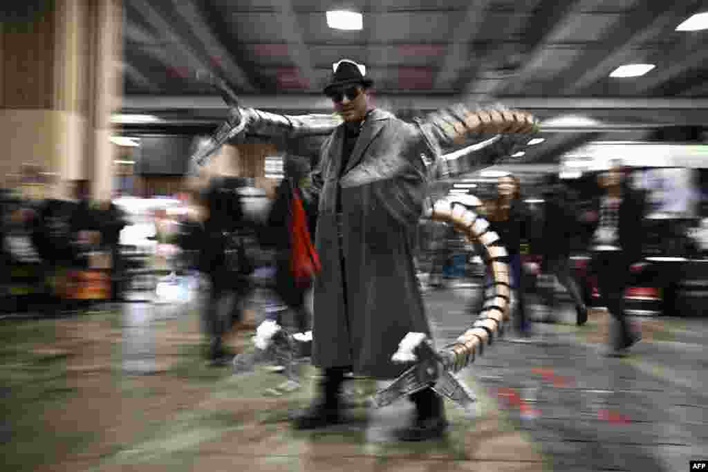 A visitor dressed up in a Doctor Octopus cosplay outfit attends during the French Comic-Con Paris, at Paris Expo Porte de Versailles.