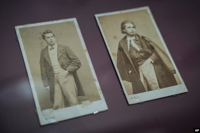 Photos of Leon Monet, left, and his brother Claude Monet on display, part of an exhibition at the Musée du Luxembourg in Paris, Monday, March 13, 2023. Claude Monet’s older sibling is the focus of a landmark Paris exhibit illuminating the never-before-known role Leon Monet played in the French Impressionist painter’s life and art. (AP Photo/Lewis Joly)