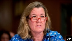 FILE - United Nations High Commissioner for Refugees Deputy High Commissioner Kelly Clements testifies in Washington, April 12, 2016